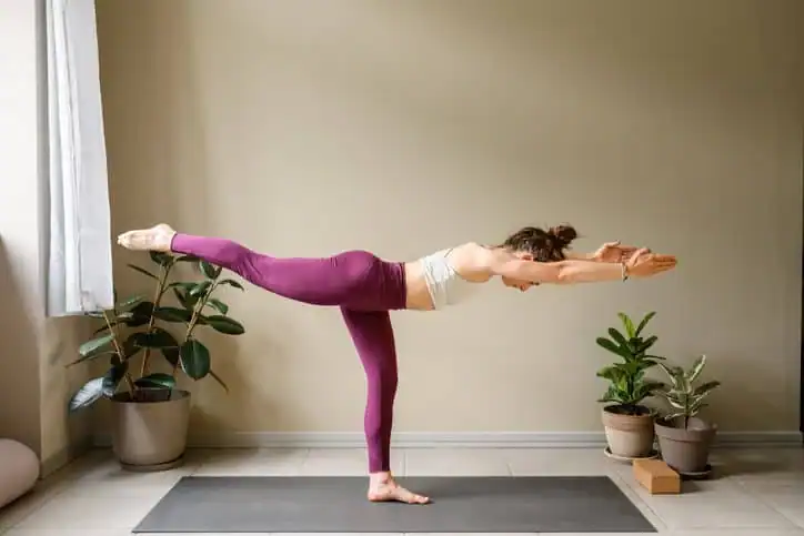 Achieving the Perfect Tone: How Often Should You Exercise for Results? 1 Woman doing Yoga exercise Crawley to help with toning the body.